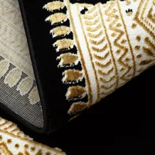 Kusový koberec Allure 1965 black/gold