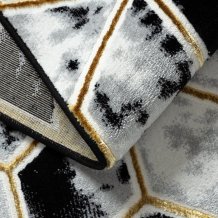 Kusový koberec Allure 1966 black/gold