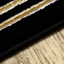 Kusový koberec Allure 1968 black/gold